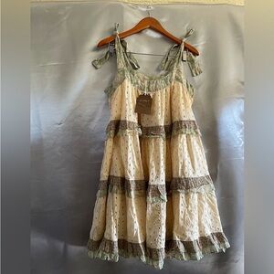 Mini dress sold by Anthropologie,feminine and beautiful. Romantic hippie vibe.